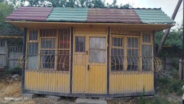 сдаю контейнер на рынке дордой: Продается коммерческий киоск в желтом цвете, подходящий для различных — 7