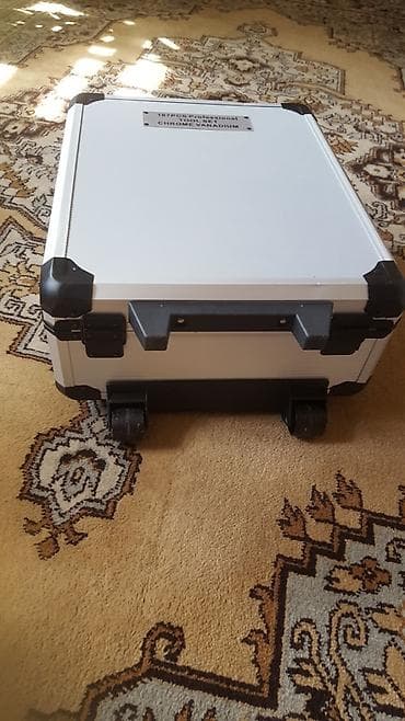 Набор инструментов 187 предметов в алюминиевом чемодане на колёсиках