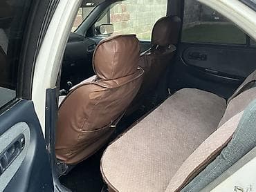 шины сайлун: Nissan Primera: 1993 г., 2 л, Механика, Газ, Седан — 5