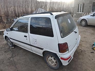Унаа: Daihatsu Cuore: 1994 г., Кол менен иштөөчү, Бензин, Хетчбек — 3