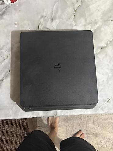 PlayStation 4 Slim (черная) Комплектация: - Консоль PS4 Slim - 2 at lalafo.kg PlayStation 4 Slim (черная) Комплектация: - Консоль PS4 Slim - 2