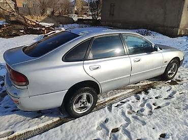 zimmer e9 pro: Mazda 626: 1997 г., 1.8 л, Механика, Бензин, Лифтбек — 2