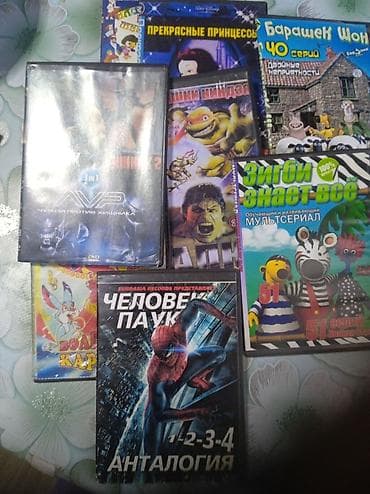 мувии: Коллекция DVD-дисков с фильмами и мультфильмами. Состав по обложкам — 2