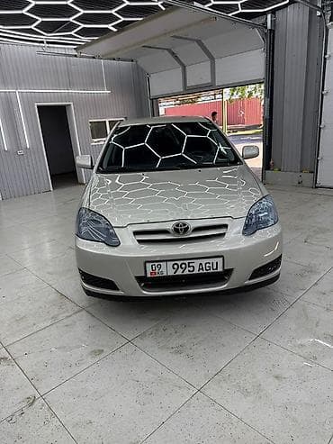 машина byd e2: Toyota Corolla: 2005 г., Автомат — 2