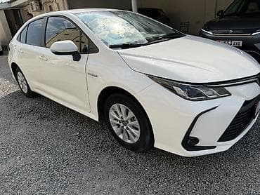 byd e1: Toyota Corolla: 2021 г., 1.8 л, Вариатор, Гибрид, Седан — 3