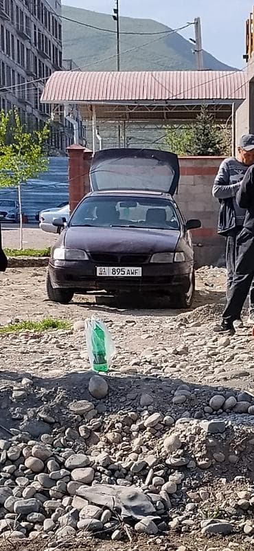 Toyota Carina E: 1992 г., 1.6 л, Механика, Бензин, Седан