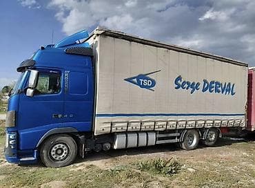 814 d: Тягач, Volvo, Тентованный — 2