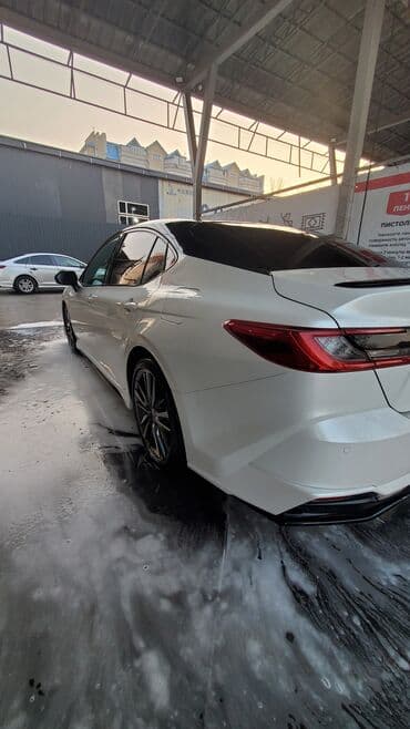 домкрат на тойота: Toyota Camry: 2024 г., 2 л, Автомат, Гибрид, Седан — 9