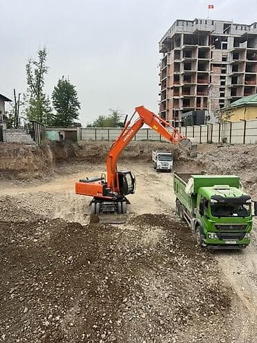 tx3 mini: Услуги экскаватора-погрузчика и самосвалов для земляных работ - — 3