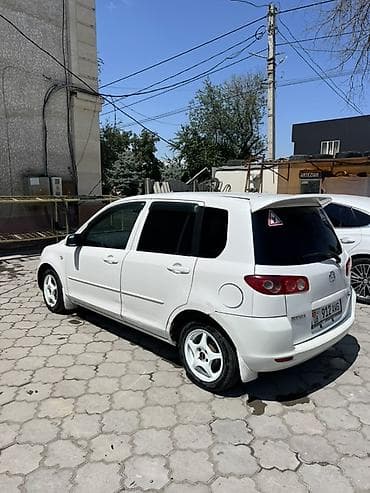 Mazda Demio: 2004 г., 1.3 л, Автомат, Бензин, Хэтчбэк — 2