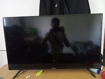 oled tv: Телевизор Skyworth, диагональ около 32–40". Особенности: - Тонкие — 1