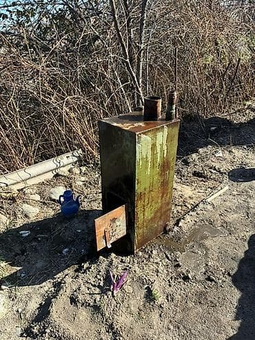 печь буржуйка: Твердотопливный котёл (металлический) - Вертикальный стальной корпус — 2