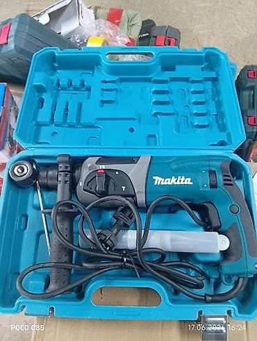 Перфоратор Makita в фирменном кейсе. Комплектация: - перфоратор — 1