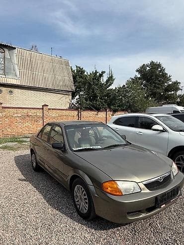 Продажа авто: Mazda Protege: 2000 г., 2 л, Автомат, Бензин, Седан — 7
