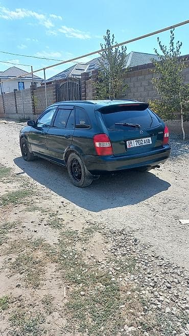 mazda kronos: Mazda Familia: 2002 г., 1.5 л, Механика, Бензин, Универсал — 5
