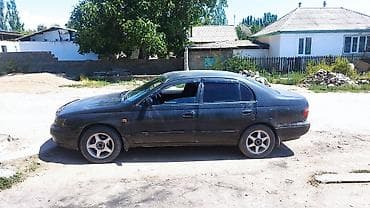 Toyota Carina E: 1997 г., 2 л, Механика, Бензин, Седан