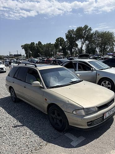хунчи авто: Mitsubishi Lancer: 1995 г., Универсал — 2