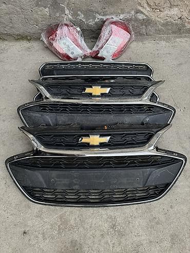 хром на бампер: Решетка радиатора Chevrolet Оригинал — 2