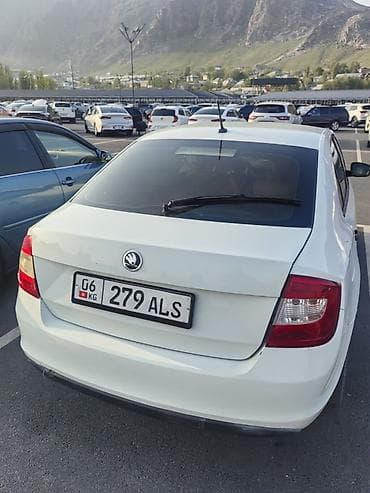 посадка авто: Skoda Rapid: 2016 г., 1.6 л, Ручные, Бензин, Седан — 5