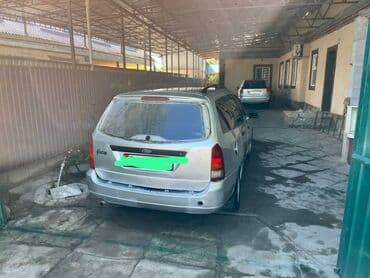 срочно продам авто в связи с переездом: Ford Focus: 2001 г., 1.6 л, Механика, Бензиновая, Универсал — 3