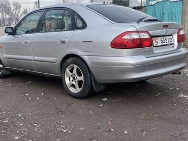 Ковролин: Mazda 626: 2000 г., 1.8 л, Механика, Бензин, Хэтчбэк — 6