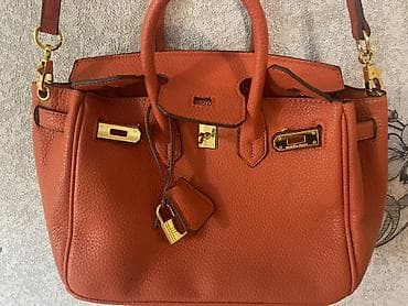 Сумки: Сумка-тоут в стиле Kelly/Birkin, оранжевого цвета. Характеристики: - — 3