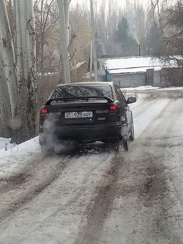 low ll: Subaru Legacy: 2000 г., 2 л, Механика, Газ, Седан — 4