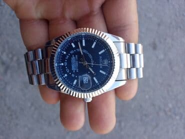 платье из панбархата на шифоне: Часы наручные Rolex Sky-Dweller, стальной корпус и браслет — 1