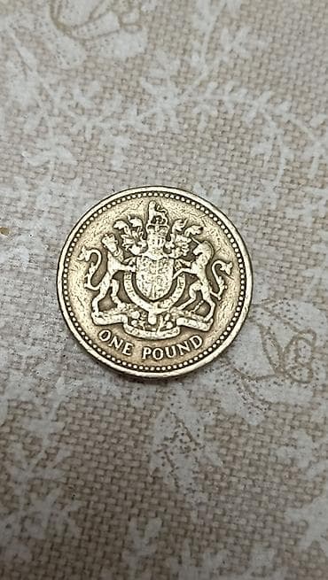 фунт: Монета 1 фунт Великобритании. Елизавета 2. Год 1983 — 2