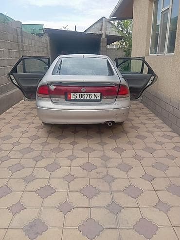 срв 5: Mazda 626: 1992 г., 2 л, Механика, Бензин, Седан — 4