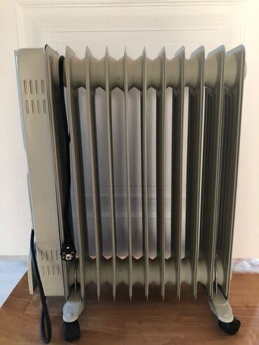 типы обогревателей: Масляный обогреватель Кол-во секций: 10 и более, Отключение при перегреве, Несколько режимов мощности — 2