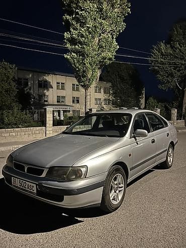 Toyota Carina E: 1996 г., 1.8 л, Механика, Бензин, Седан at lalafo.kg Toyota Carina E: 1996 г., 1.8 л, Механика, Бензин, Седан