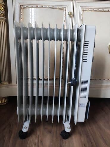 энергосберегающий обогреватель: Масляный обогреватель Кол-во секций: 10 и более, Быстрый нагрев, Встроенный вентилятор, Несколько режимов мощности — 7