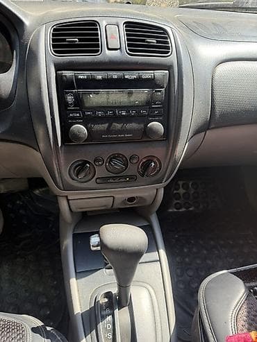 Mazda 323: 2001 г., 1.5 л, Автомат, Бензин, Универсал — 9