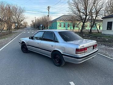 124 e500: Mazda 626: 1993 г., Седан — 2