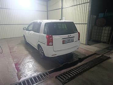 Транспорт: Toyota Raum: 2005 г., Автомат, Бензин, Минивэн — 7