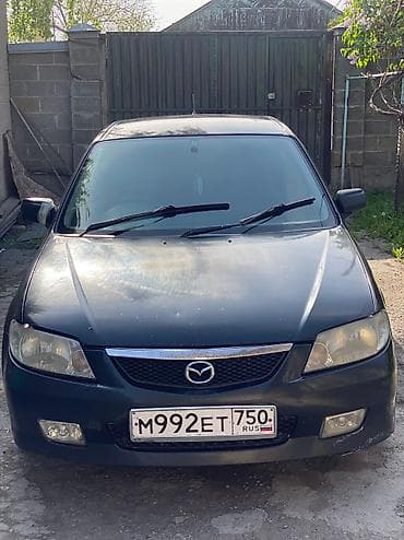 Mazda Familia: 2001 г., 1.5 л, Автомат, Бензин, Хетчбек lalafo.kg да Mazda Familia: 2001 г., 1.5 л, Автомат, Бензин, Хетчбек