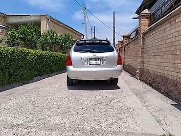 Nissan Primera: 2002 г., 2 л, Вариатор, Бензин, Универсал — 7
