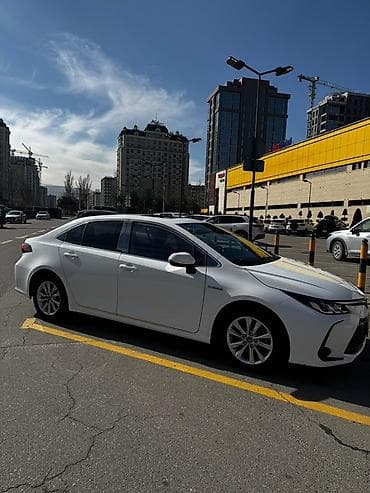 coroll: Toyota Corolla: 2024 г., 1.8 л, Автомат, Гибрид, Седан — 2
