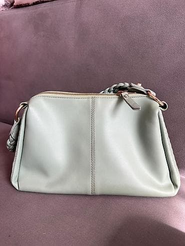 Сумка женская, компактная, светло‑мятного оттенка. - Материал