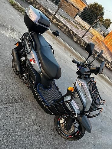 Скутеры: Скутер (Adventure-style) 150–200 см³, автомат (CVT) Особенности и — 2