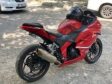 Мотоциклы: Спортивный мотоцикл в стиле sportbike, ярко‑красный. Основные — 5