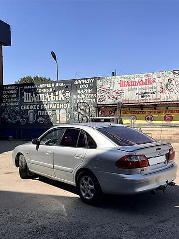 2 8: Mazda 626: 2001 г., 2 л, Механика, Бензин, Седан — 7