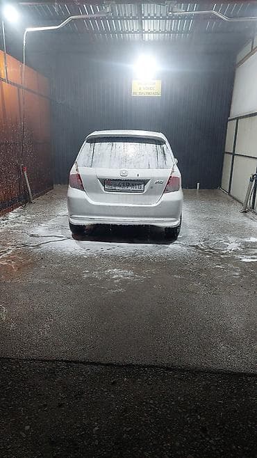 недорогие электромобили: Honda Fit: 2003 г., 1.3 л, Автомат, Бензин, Хэтчбэк — 2