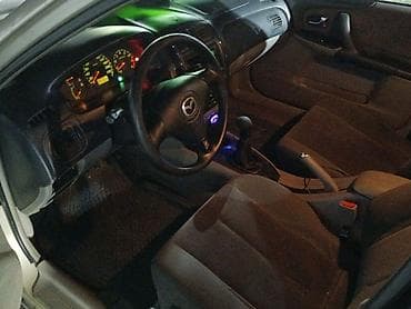 мотор 323: Mazda 323: 2001 г., Седан — 8