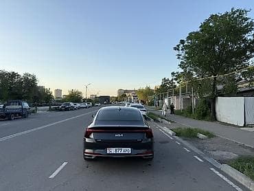 aion v: Kia K8: 2021 г., 1.6 л, Робот, Бензин, Фастбек — 4