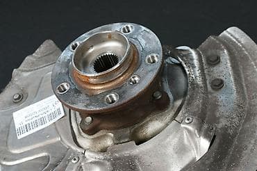 х5: Кулак поворотный правый (цапфа) на BMW x5 E70 Цена без подшибника — 3