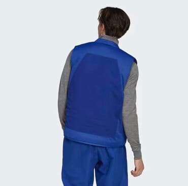 вебасто мокрый: Adidas. Водоотталкивающий и ветрозащитный пуховый жилет, способный — 3