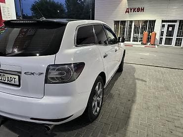 митцубиси кольт: Mazda CX-7: 2011 г., Кроссовер — 6