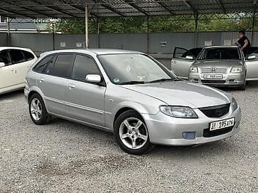 обмен на хариер: Mazda 323: 2001 г., 1.6 л, Механика, Бензин, Хэтчбэк — 3